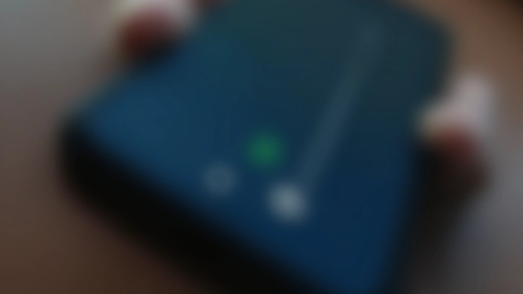 Mobile phone showing toggle switch between dark mode and light mode settings interface
